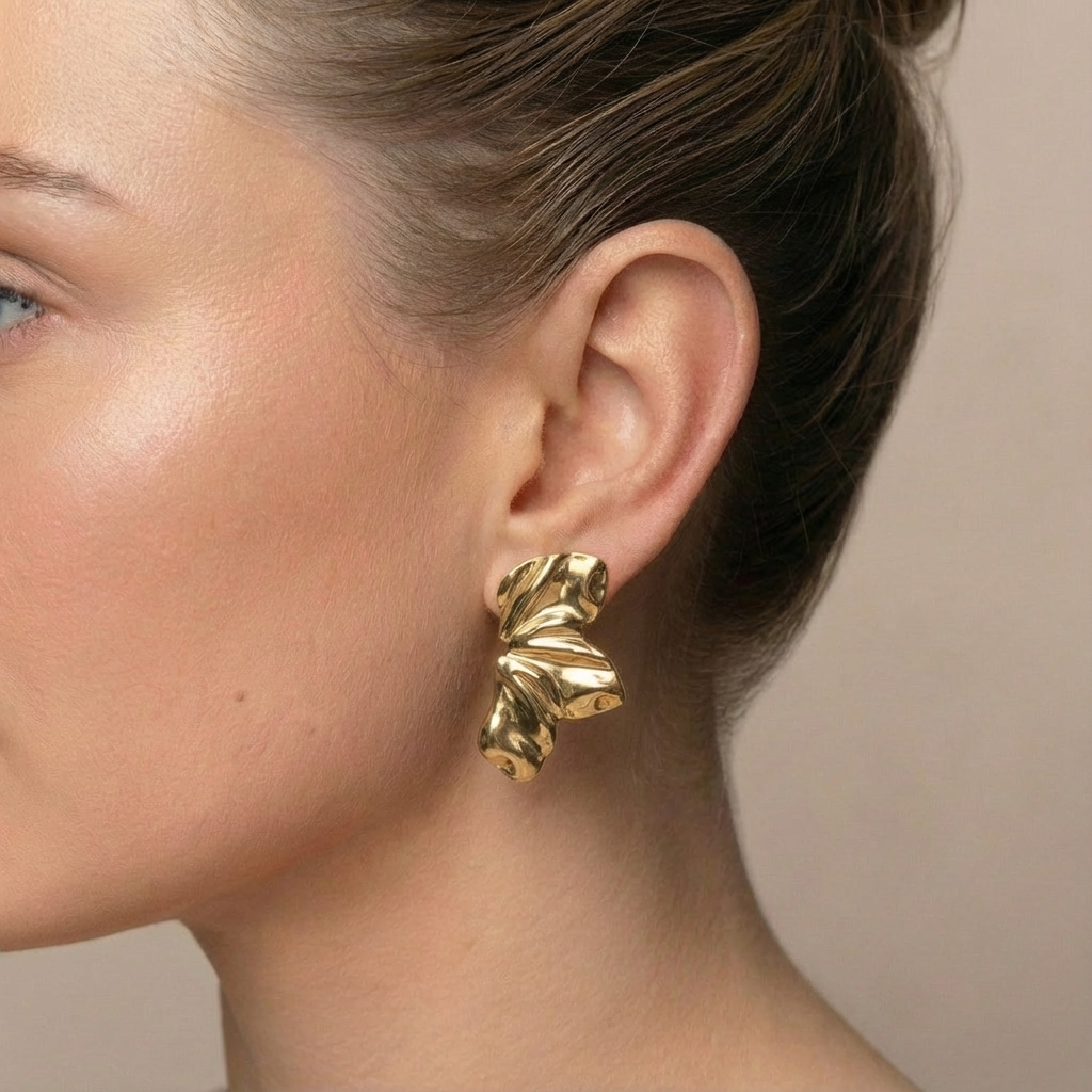 Flower wing earrigs gold