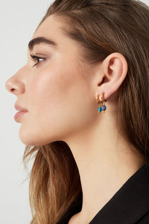 Earrings with September stone - gold/blue