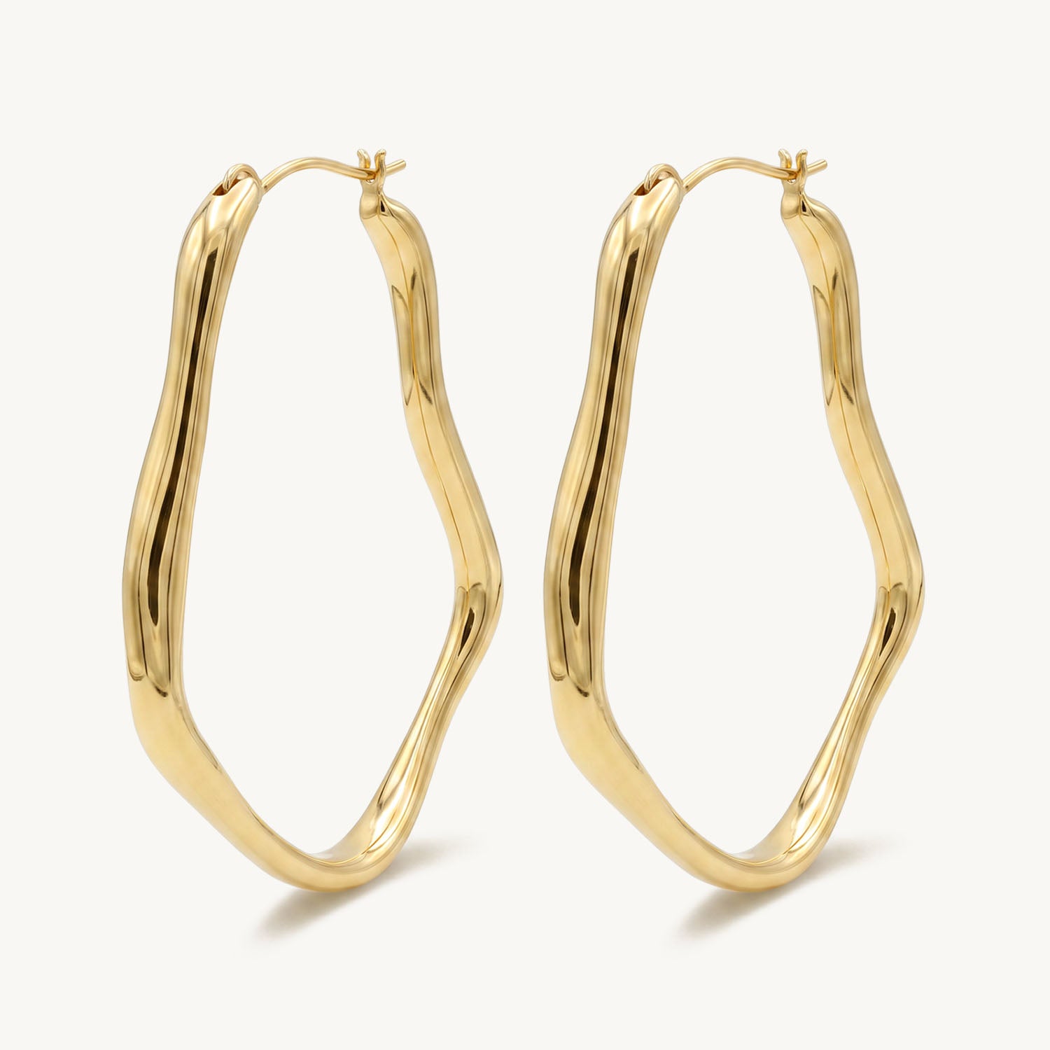 Abstract earrings gold